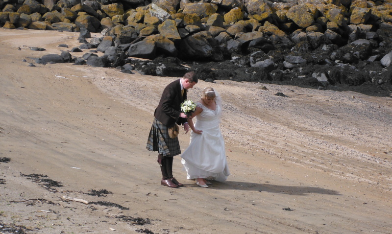  the bride and groom on the beach